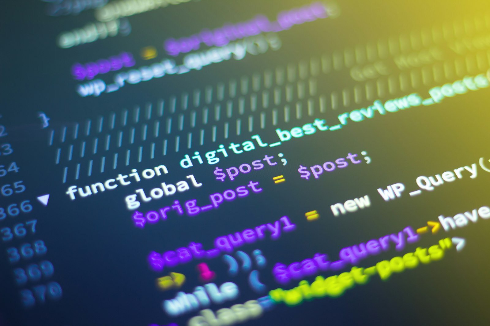 Close-up of source code on a monitor—the dependency surface industrial Rust teams must govern. Photo: Unsplash.