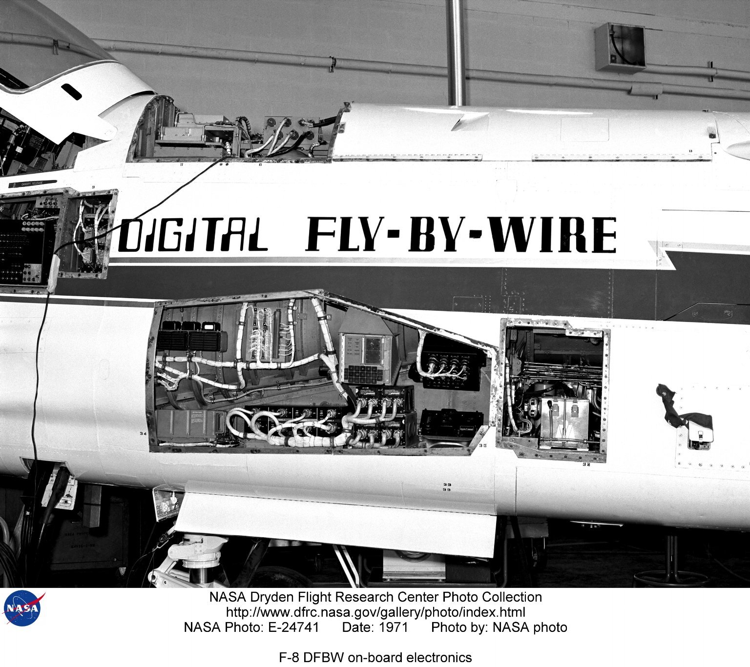 Open avionics bays on NASA's F-8 Digital Fly-By-Wire research aircraft, 1971, showing the flight computer hardware. NASA photo, public domain.