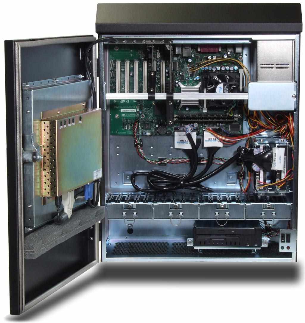 A wall-mounted industrial PC with its front door open, showing a flat-panel display and the computer chassis inside a steel enclosure.